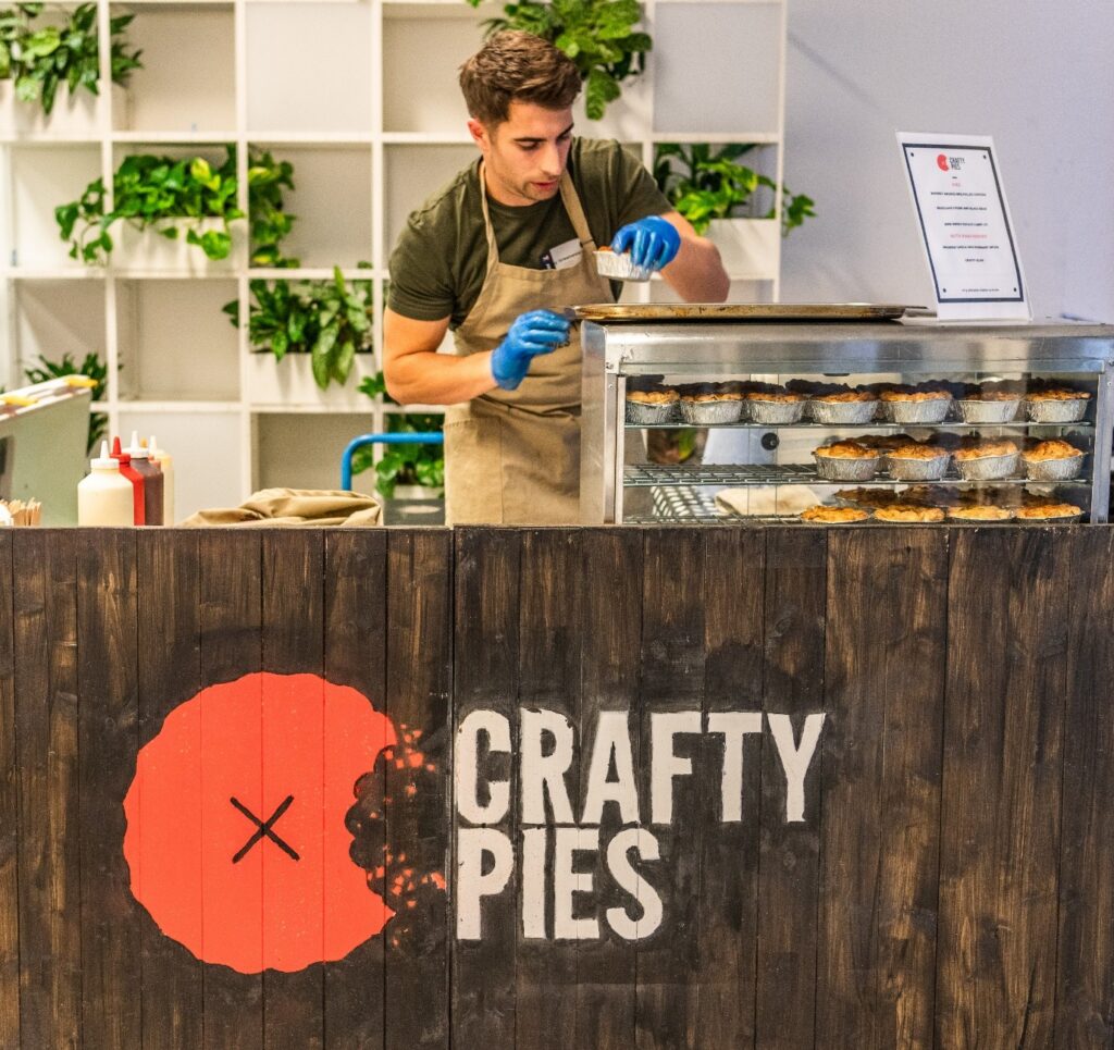 Corporate event catering trader serving lunch