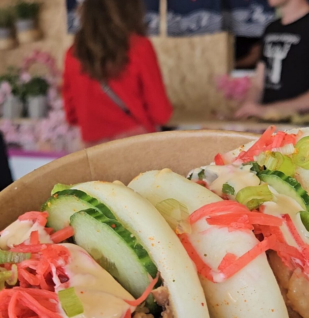 Bao buns in a bowl served to a guest