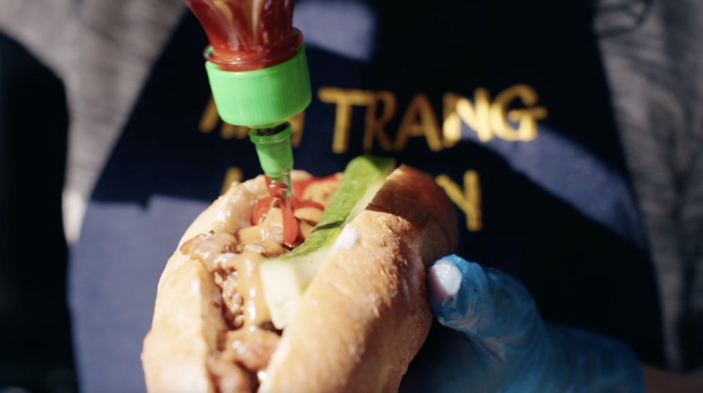 Hot dog being served