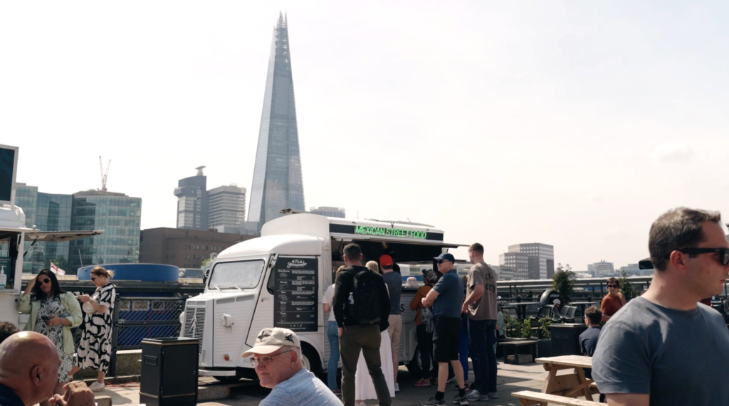 Mexican street food trader in front of the Shard in London