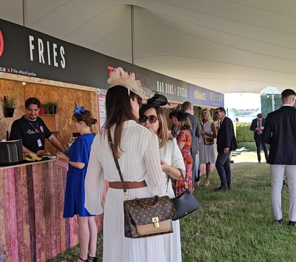 Guests at Ascot deciding which food stall to eat from